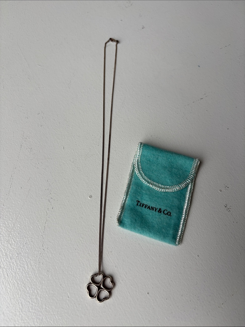 Tiffany & Co. 925 Sterling Silver Four-Heart Clover Necklace with Blue Pouch
